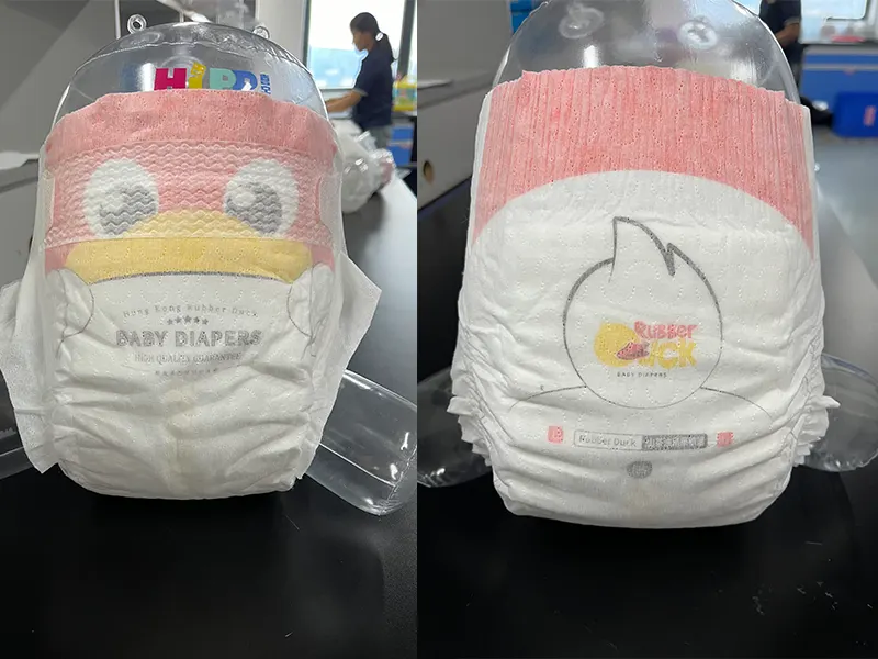 Two packs of Rubber Duck pull-up diapers, front packaging and sizes