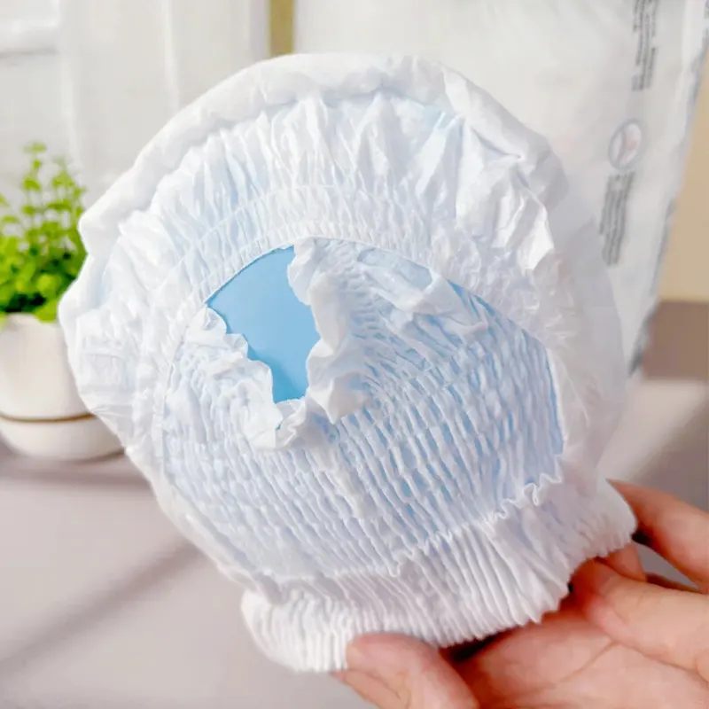 The side pictures of baby diapers show the leak guard design