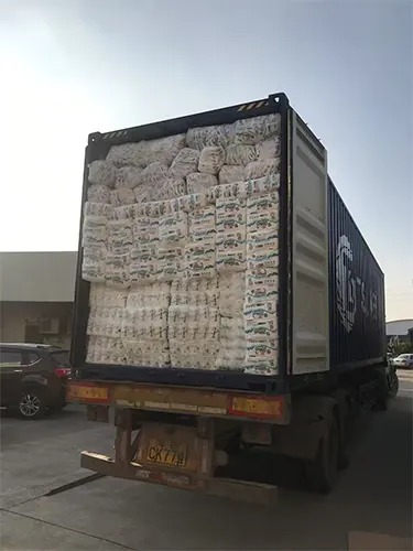 Container truck loaded with packaged baby diapers ready for shipment.
