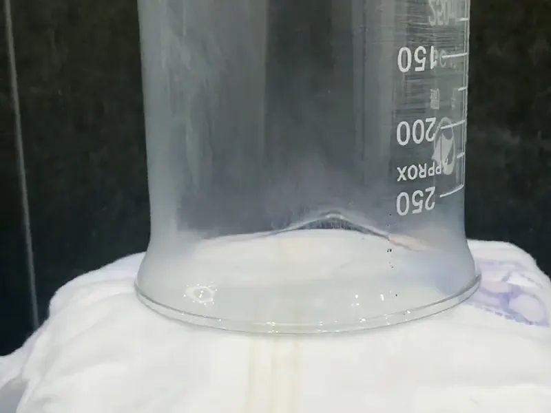 Breathability test—glass beaker over diaper showing airflow