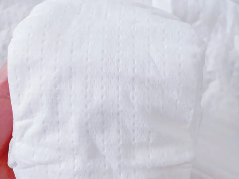 Breathable, skin-friendly topsheet with micro-perforations, soft to the touch.