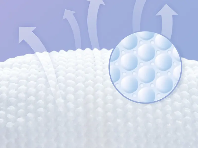 Breathable nonwoven diaper topsheet with airflow arrows