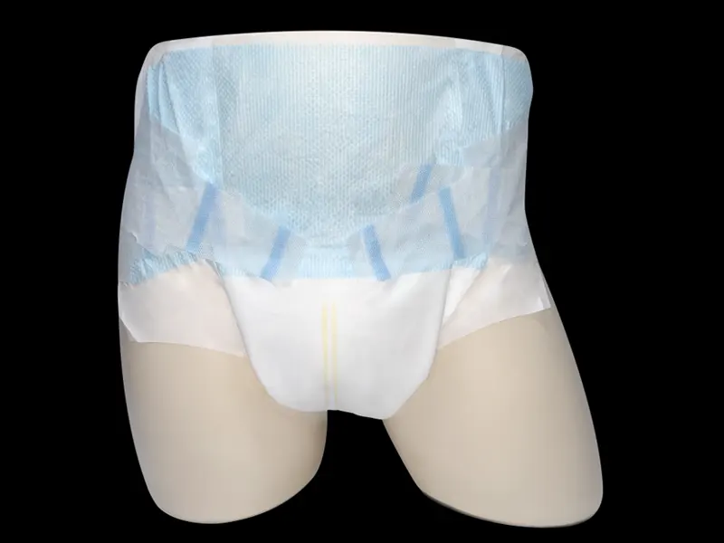 Mannequin wearing pull-up adult diaper with blue front waist panel and wetness line.