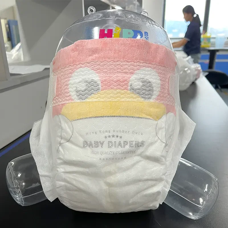 Rash-free baby diaper, unfolded to show fabric texture and leak-guard edges