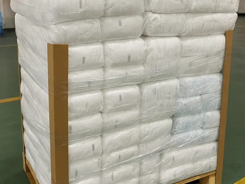 Shrink-wrapped pallet of diapers showing stable, bulk supply