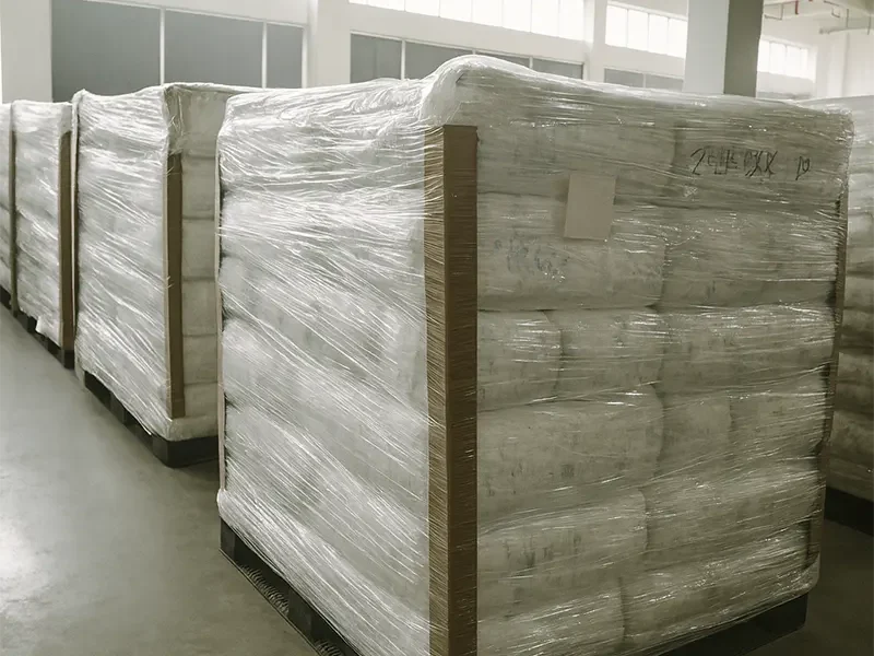 Diaper pallets in warehouse aisle—possible packaging/print variations